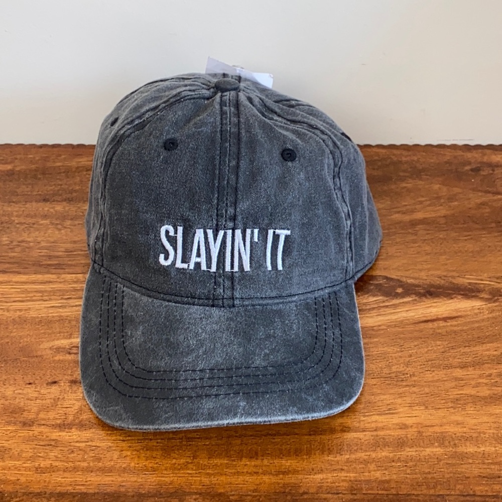 NEW. Ball Cap/Hat with adjustable strap. One size.